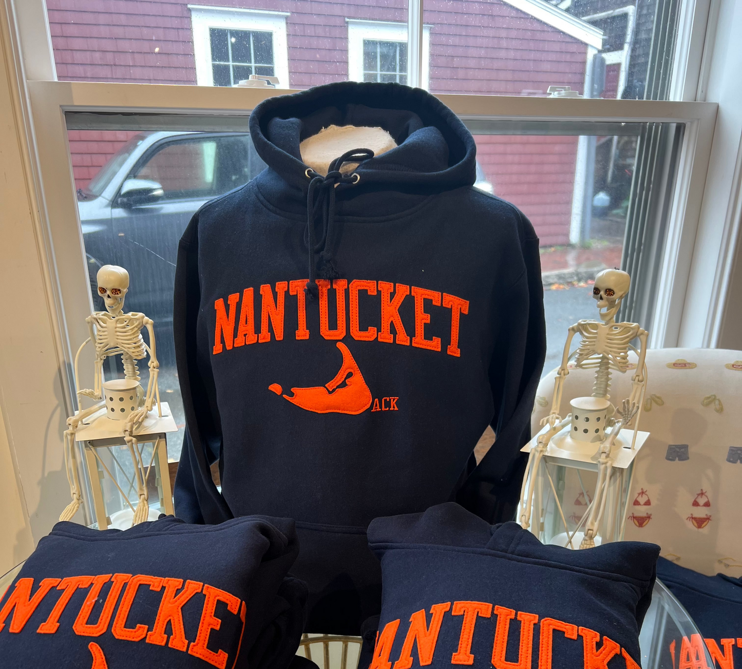 Navy hooded sweatshirt with orange felt